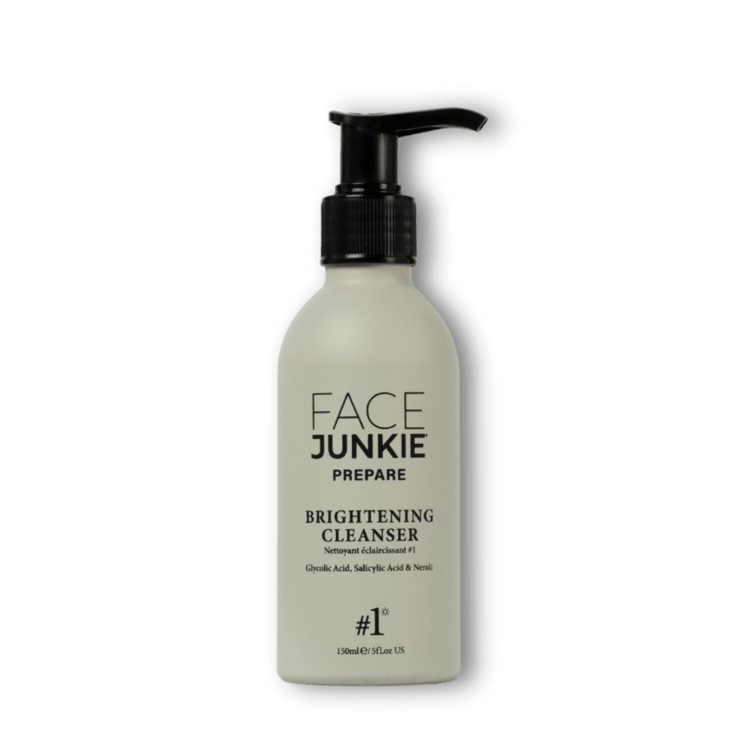Face Junkie Brightening Cleanser in a sleek, minimalist pump bottle. Infused with glycolic acid, salicylic acid, and neroli, this exfoliating facial cleanser gently removes impurities, unclogs pores, and promotes a radiant complexion. Designed to prep the skin for hydration and treatment, Face Junkie’s brightening cleanser supports an even skin tone and a glowing, healthy appearance through high-performance, clean beauty formulations.