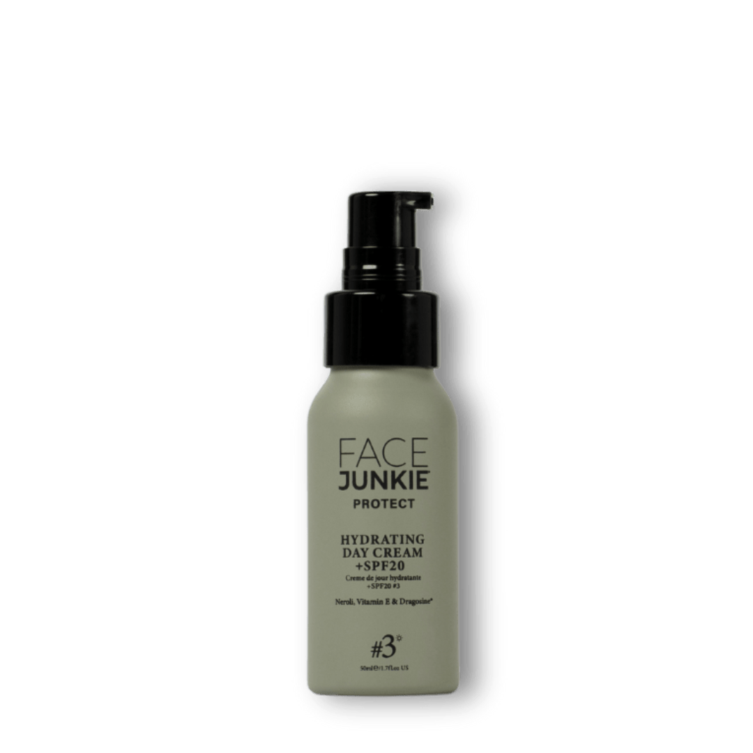 Face Junkie Hydrating Day Cream with SPF 20 in a sleek, minimalist pump bottle. Infused with neroli, vitamin E, and Dragosine®, this lightweight moisturiser hydrates the skin while providing broad-spectrum sun protection. Designed for daily use, Face Junkie’s day cream helps shield against environmental damage, promoting a nourished, radiant complexion through clean beauty and high-performance skincare.